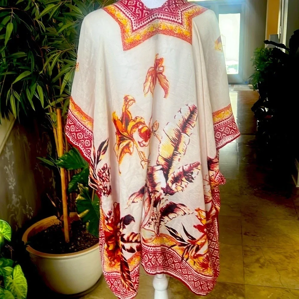 Vince Camuto ladies wrap one size NWOT. Cream yellow and red colors one size